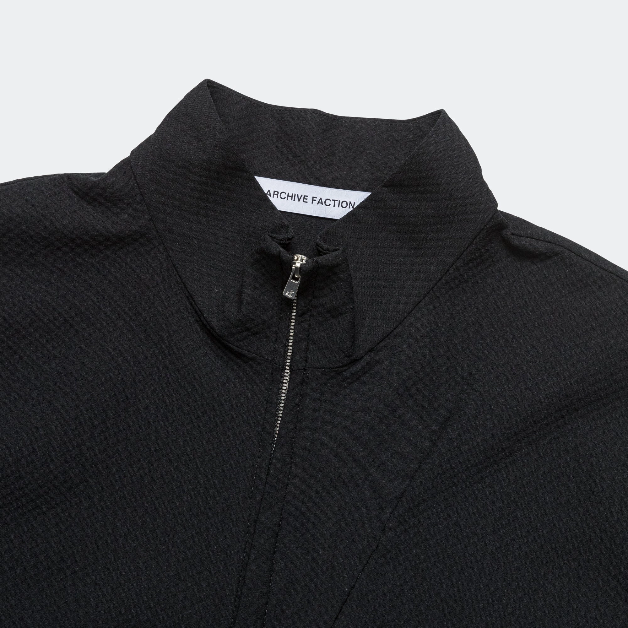 RubberizedButtonClosures Shrink Resistant Treatment 8.0 Track Jacket Right - Black