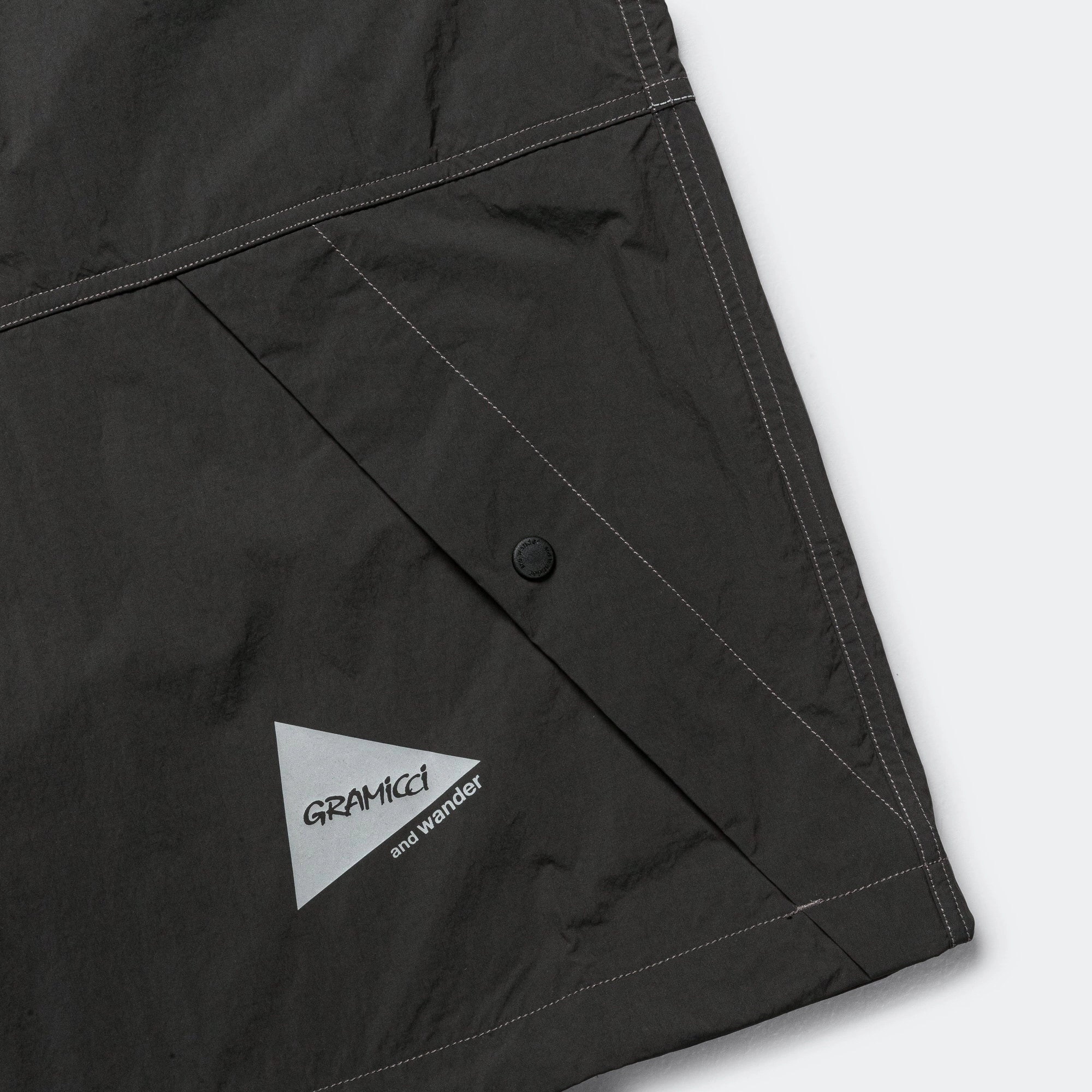 Pocket Placement Brushed Nylon Vest x and wander - Charcoal