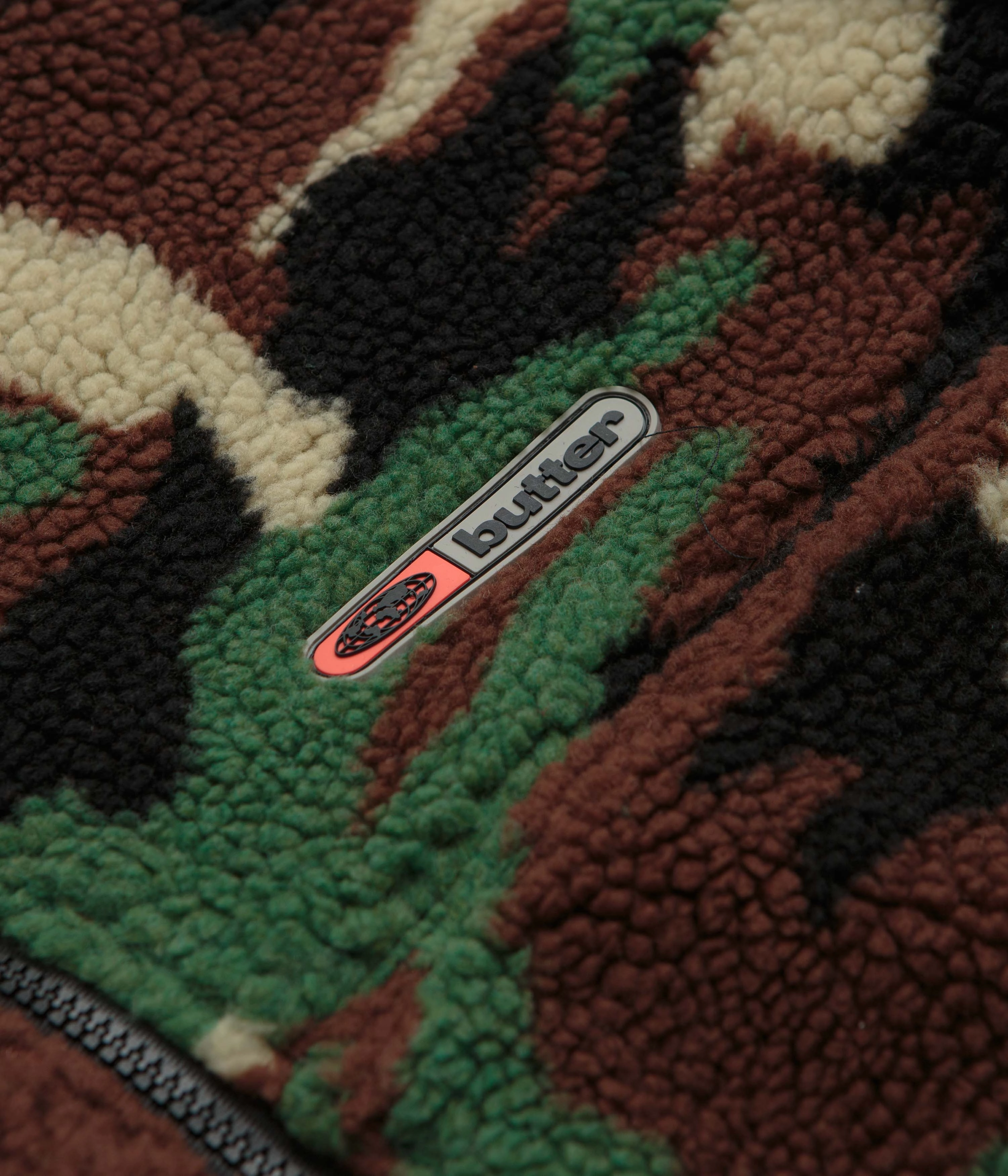 Butter Goods Camo Sherpa Jacket - Forest Green suitable for solo travel