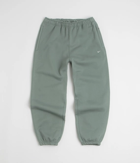 Nike Solo Swoosh Cuffed Sweatpants - Clay Green / Clay Green / White Layered Wear WindResistantMaterial