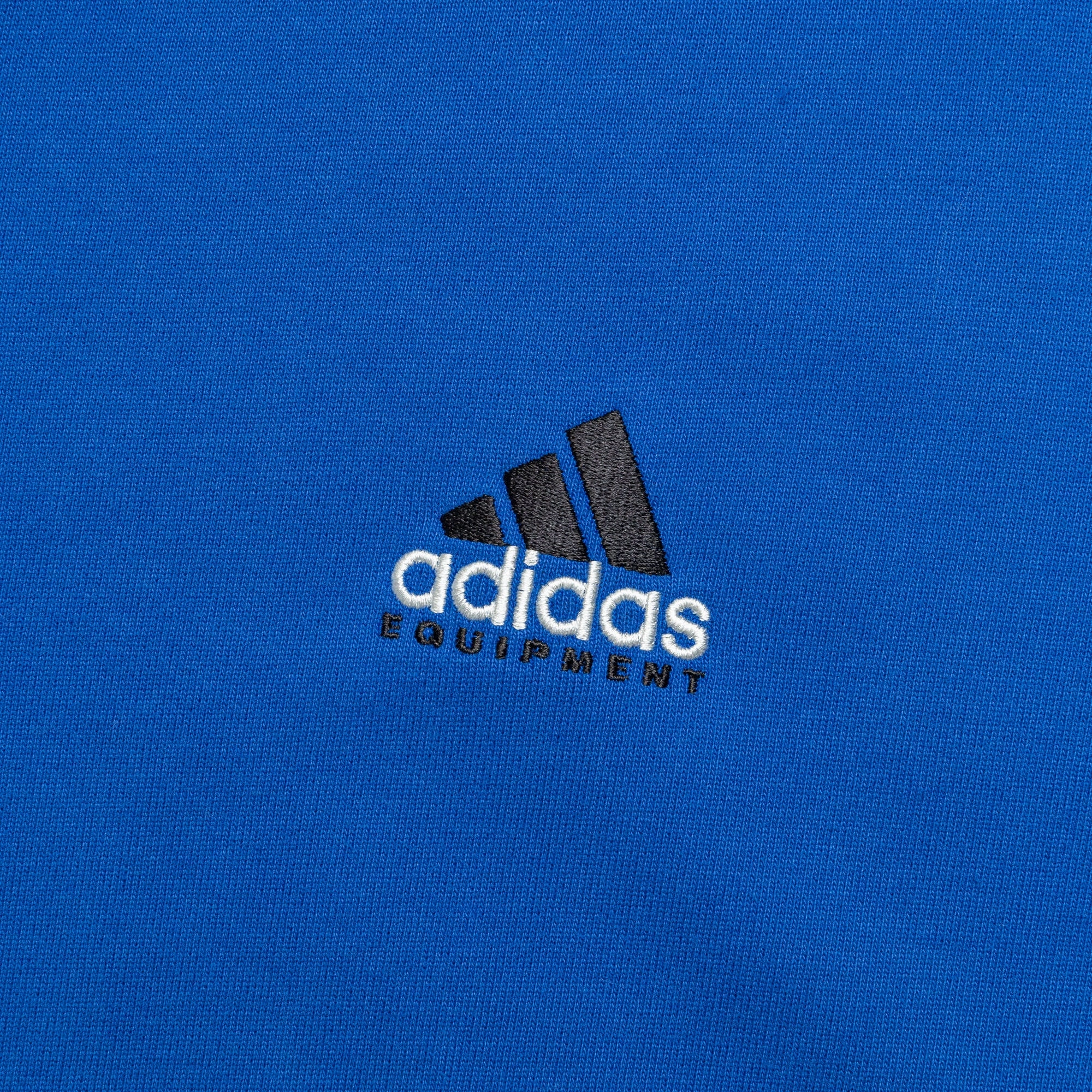 Chic and Soft Fashion-Forward Look EQT Small Logo Tee - EQT Blue