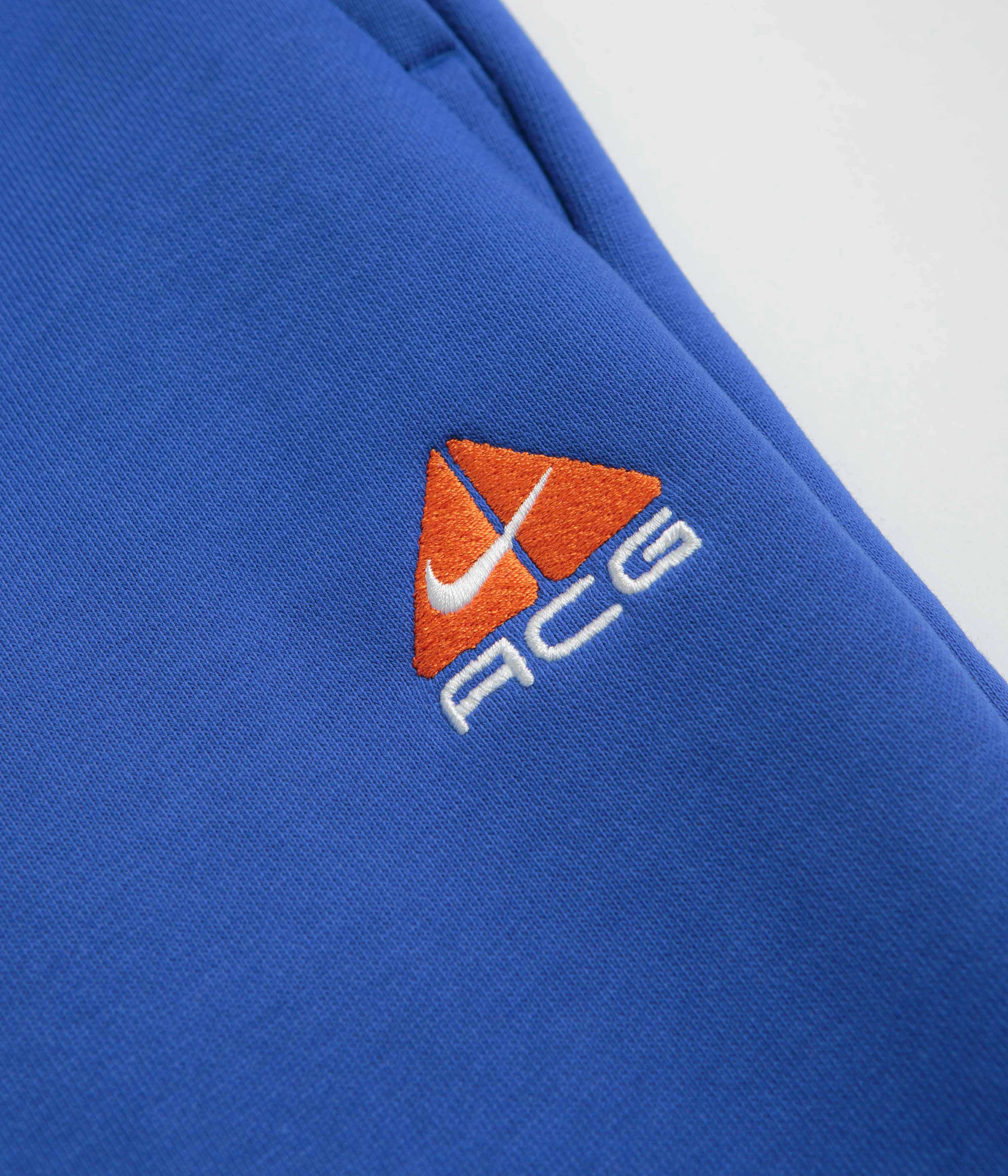 Nike ACG Tuff Fleece Lungs Pants - Game Royal / Safety Orange / Summit White Trendy Vibe