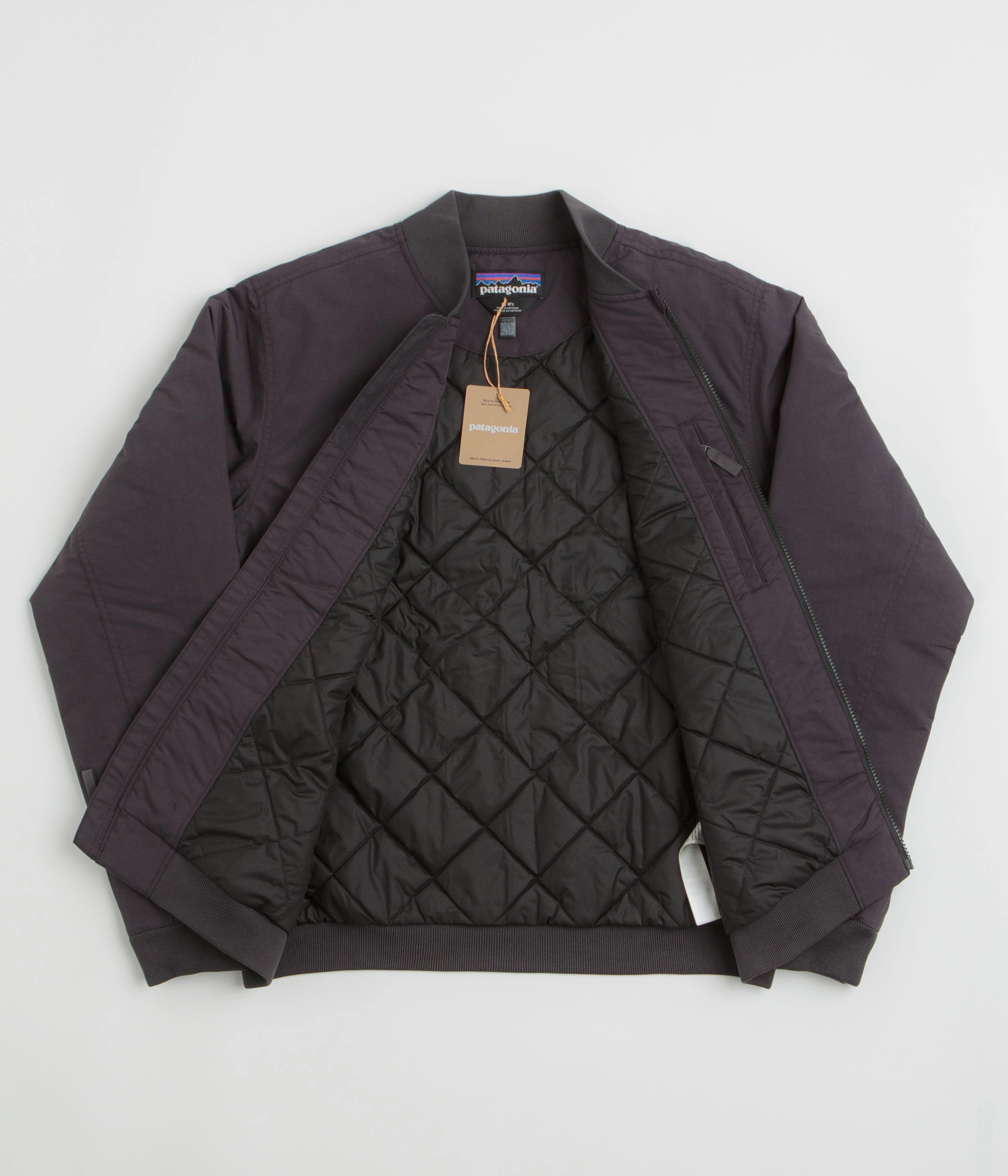 festival - goers bus ride Patagonia Isthmus Deck Jacket - Ink Black