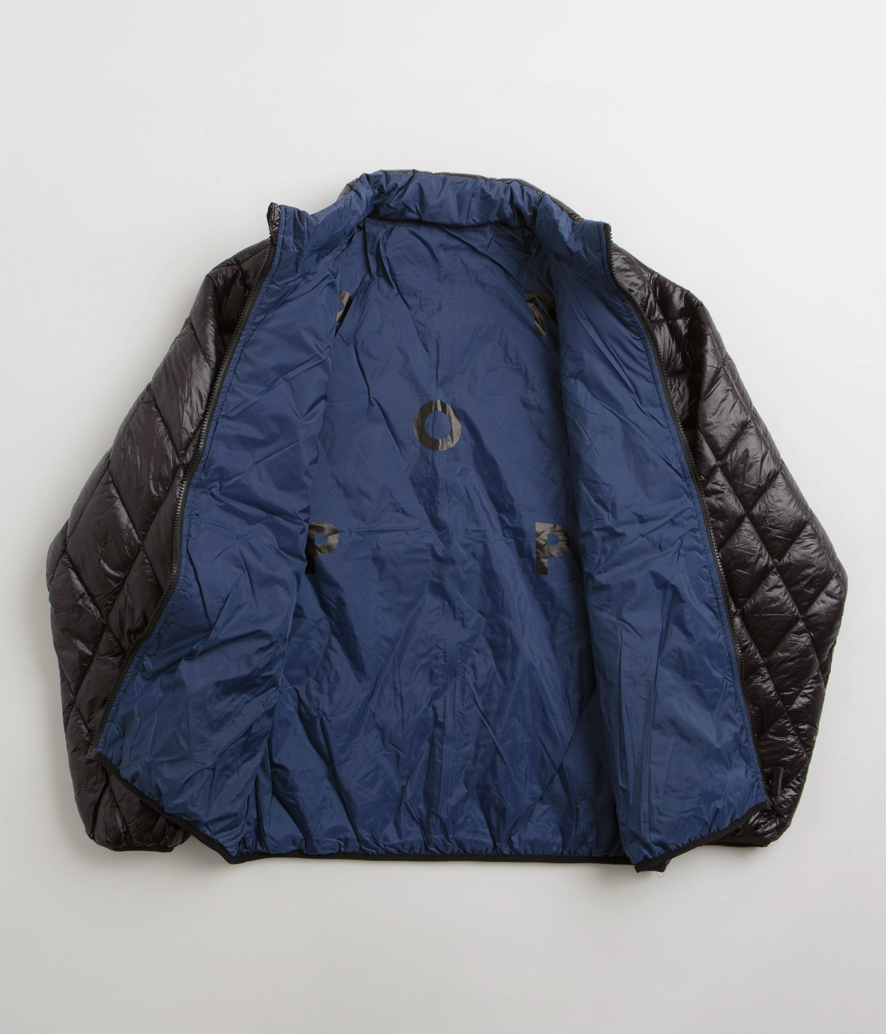 Pop Trading Company Quilted Reversible Jacket - Black Performance Outerwear Compact Storage