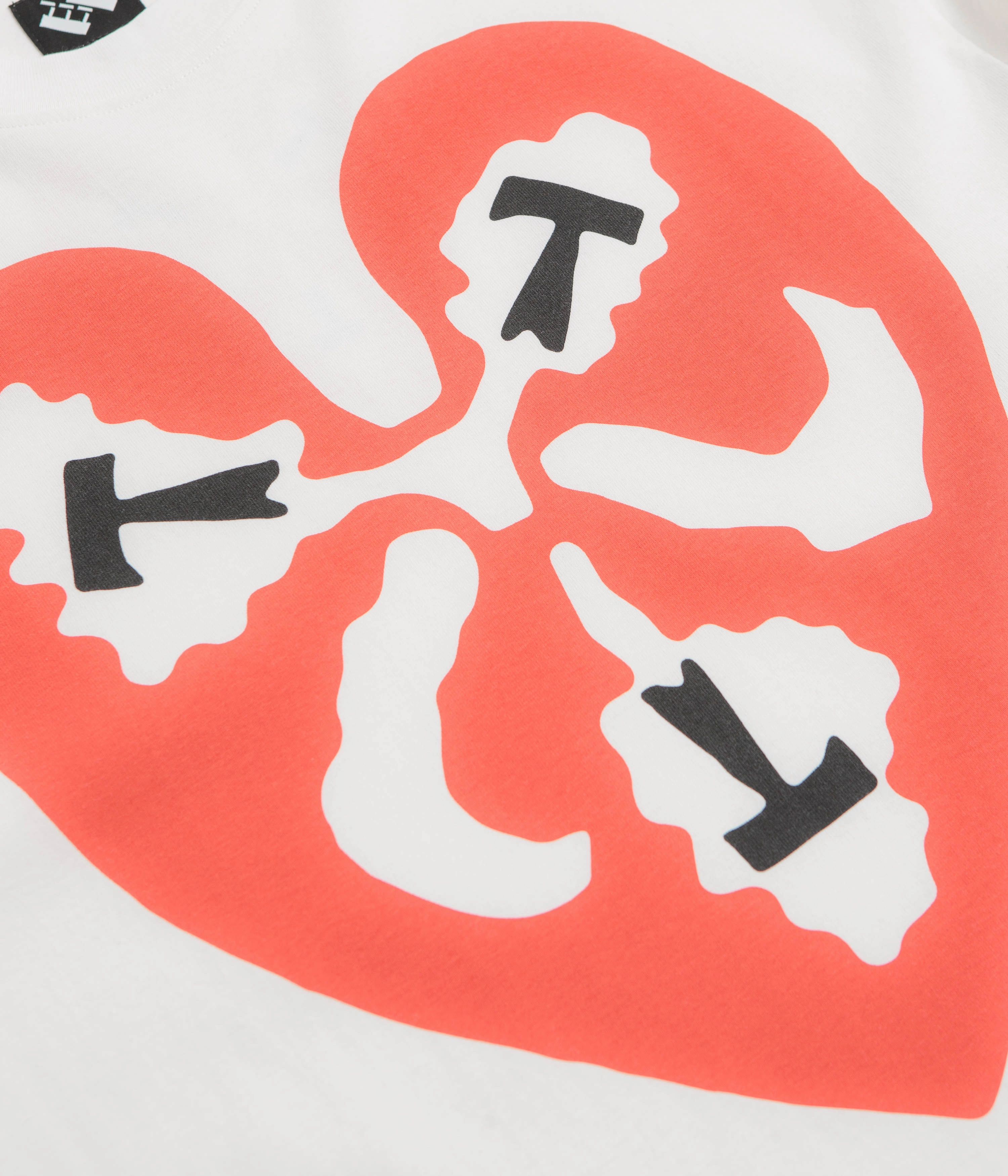 Fuzz Free Surface Micro Perforated Fabric The Trilogy Tapes Heart T-Shirt - White