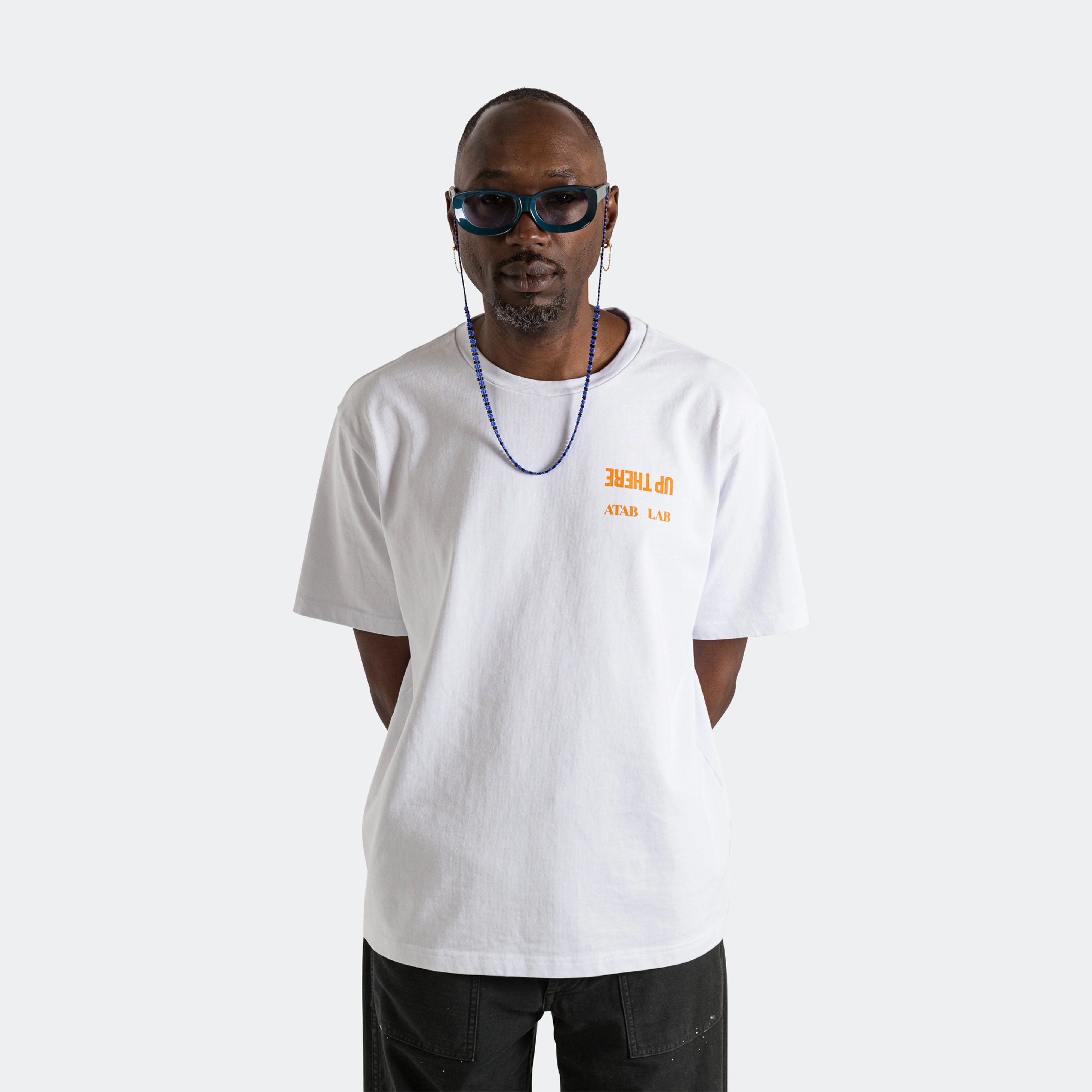UP THERE X ATAB Lab 'Chess Man' Tee - White/Tangelo warm weather Relaxed fit wear